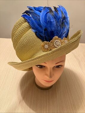 Chic Metallic Gold Straw Hat with Blue Feather Accent